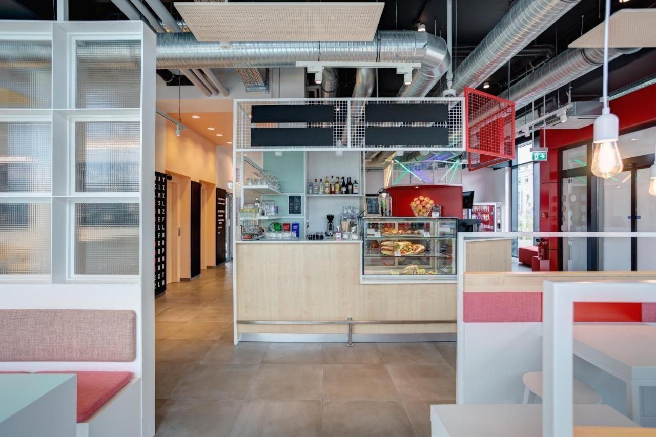 Meininger Hotel Heidelberg Hauptbahnhof Экстерьер фото