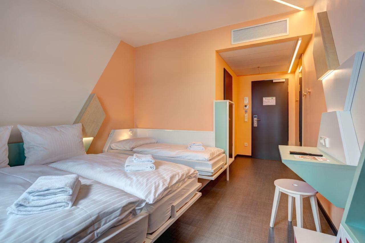 Meininger Hotel Heidelberg Hauptbahnhof Экстерьер фото